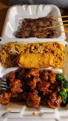 General's Chicken combo with fried rice & an egg roll with a side ored of beef teriyaki.