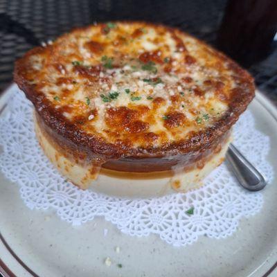 French Onion Soup. Very good. Not too salty. Cheese broiled just right.  Also got the seafood stuffed banana peppers. So good