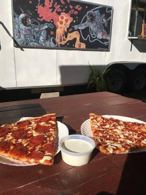 A Lunar slice of each - Pepperoni and Cheese with a side of their homemade ranch.