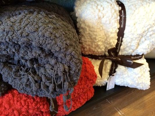 It's getting cold out.  Time to cozy up to the fire with a throw blanket from BlissLiving Home.  One of the most popular items!