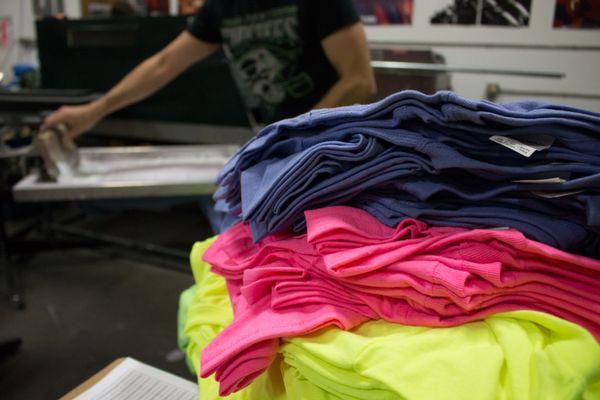 A rainbow of shirts just waiting for a splash of awesome!