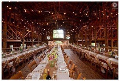 Bistro lighting, Natural wood chairs, Flatware, China, Crystal wine glasses