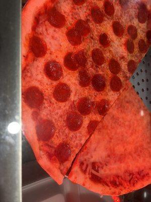 Pizza.  Under the lights. Wish this wasn't so red.