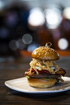 The Durango: Angus beef, jalapeño cream cheese, red leaf lettuce, roasted red peppers, friend onion straws and pecan-smoked bacon. DELISH!