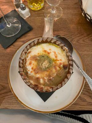 Greek Onion Soup with Kefalograviera cheese and rosemary pesto. This is amazing.