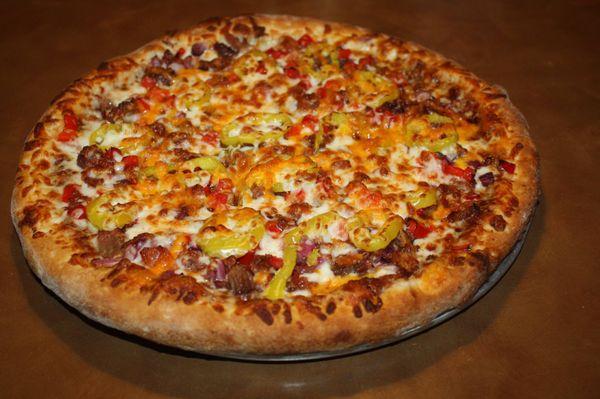 The Smokehouse: BBQ sauce, mozz, cheddar, bacon, brisket, banana peppers, red bell pepper, red onion