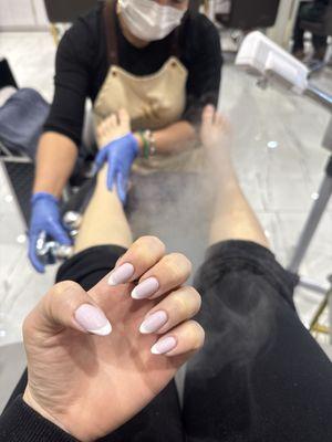 Manicure and pedicure with massage and steamer