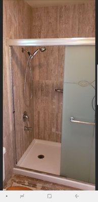 Shower pan with tile and fixtures in San Ramon