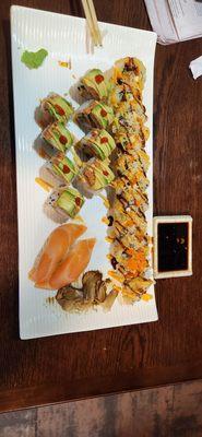 Las Vegas roll on top and Hot Mama roll on bottom next to salmon sushi.