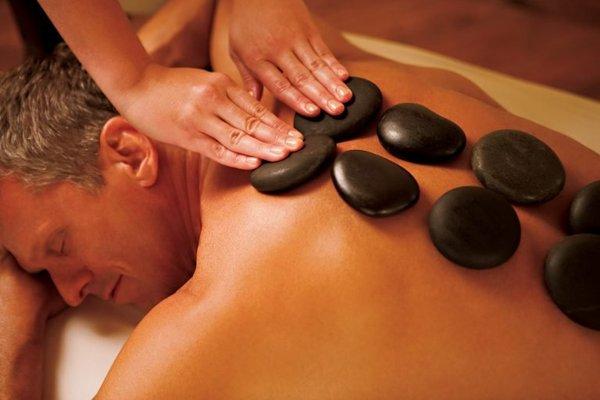 Hot Stone massage to relieve knotted muscles