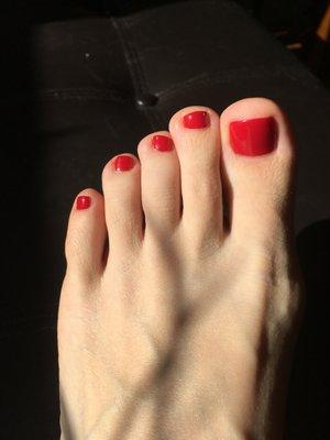 Pedicure with bright red polish. Didn't want to post a "before" picture because they nastay.