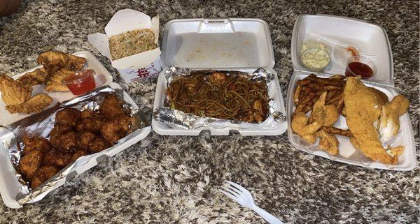 Cream Cheese Puffs, General Q chicken, Vegetable Rice, Seafood Noodles, Fried Shrimp and Fish plate.