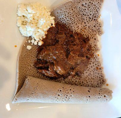 Kaye Wot (Beef) and injera (flat bread)