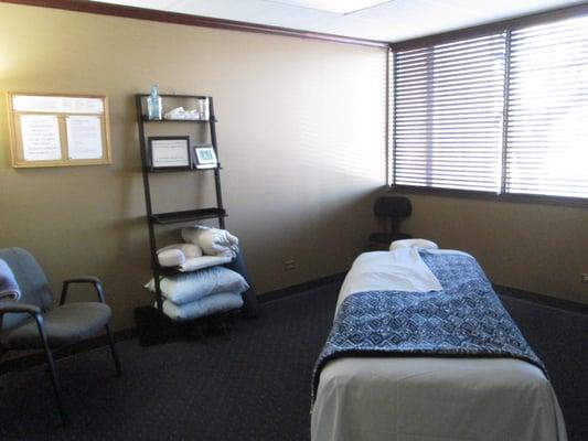 Kick back and relax in our massage room.