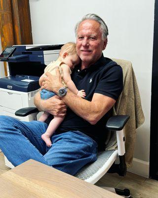 Founder, Dan Wesson, with Chelsea Dietz's, our Community Manager, precious baby Ellie