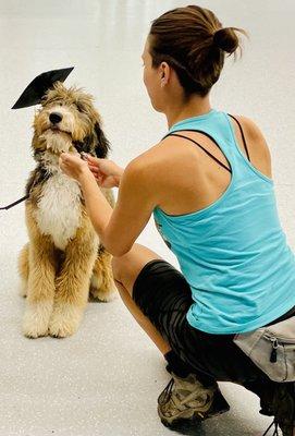 Truffle receives her honors from her trainer , Karli!