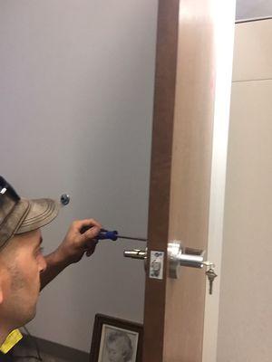 Installing Comercial lever lock on office door .