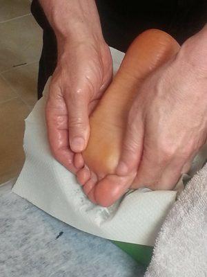 Ayurvedic foot massage, reflexology