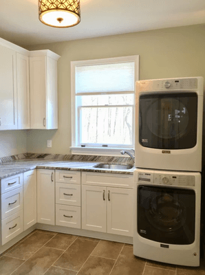 Brown fantasy granite laundry countertops in Maryland. Call today 240-330-9008 Carlos