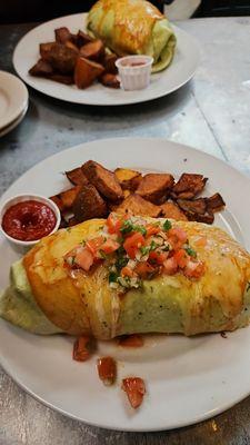 Enchilada Style Burrito  braised short rib, Spanish rice, black beans, pepperjack cheese, soft scrambled eggs; home fries.