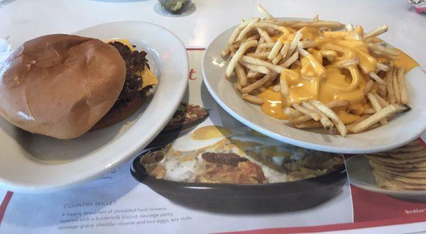 Triple cheeseburger with a large order of cheese fries.