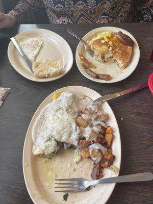 Spinach mushroom omelette home fries and white gravy. Fluffiest damn pancakes we've ever had! So good!