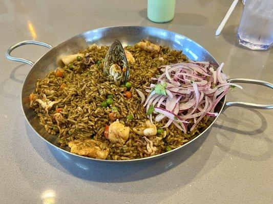 Arroz con Mariscos ...... $28.95 Peruvian Paella is a 2/5 good because the rice was dry and partially cooked.