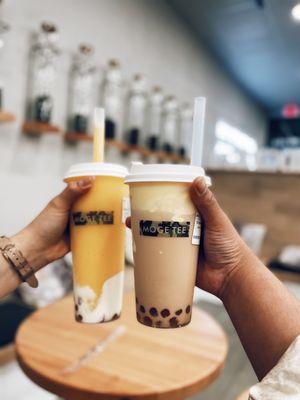 L: Fresh mango tea w/ cheese foam and boba R: creme brûlée milk tea w/ boba