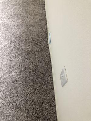 Look at this. I did let them know before carpet was installed about this bump but I guess silicon was their option to fix it.