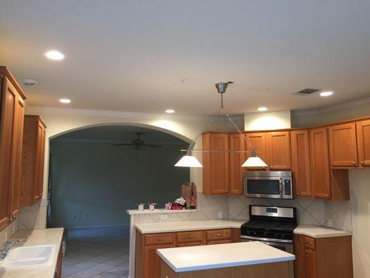 We installed LED recessed can lights in a kitchen that brightened up the place!