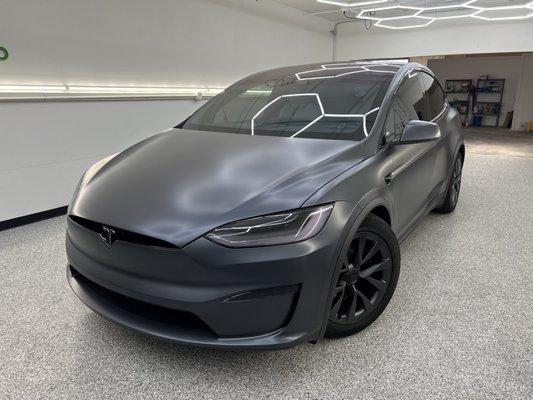 Full Model X wrapped in Xpel Stealth and lights tinted with STEK Dyno shade