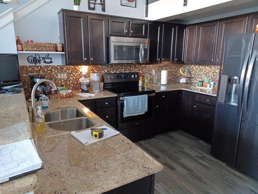 kitchen tile floor with new backsplash