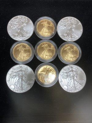 1/2 oz Gold Eagles and 1 oz Silver Eagles