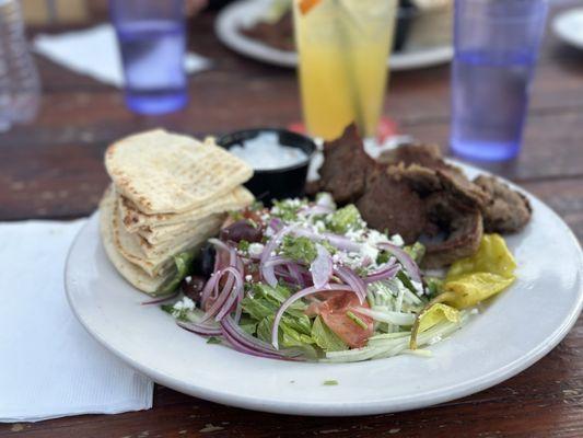 Gyros Plate - Strips of rotisserie Lamb, Greek salad, pita bread, tzaziki and feta.