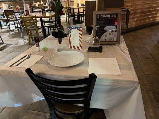 Table set up near the main entrance on Veteran's Day for those veterans who are no longer with us.