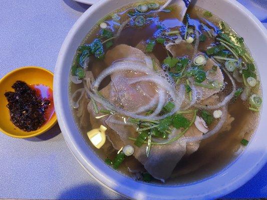 Pho Tai Nam (lean eye round beef with flank beef) with sate (chili oil)  on the side medium bowl