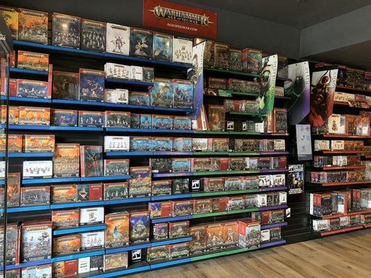 Many shelves full of Warhammer items