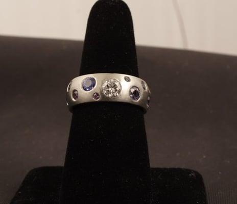 14k white gold 1/2 carat diamond with blue and purple sapphires