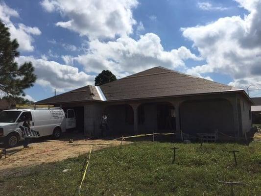 This is our Huntington model with front porch.  Waiting on it's roof and stucco to make it pretty!...