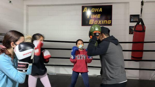 Pro boxer Arnold Dinong teaching our youth boxing combinations.