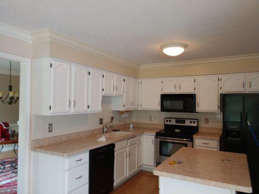 Painted white cabinets.