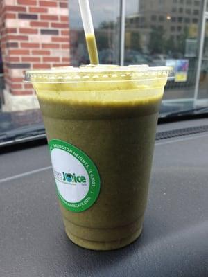 Looks weird.  [sip]  Tastes amazing!  [sip]  Like bananas and strawberries.  [sip]  It has raw kale?  [sip]  Still looks weird.