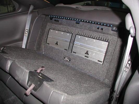 Amplifier rack behind rear seats