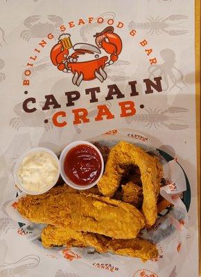 Fried tilapia lunch special with cajun fries.