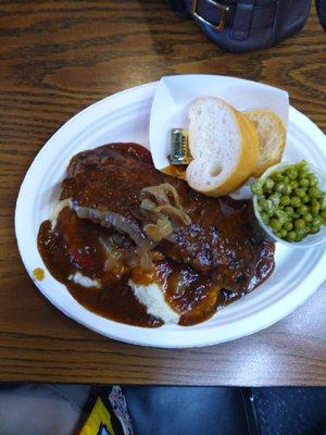 This is Tuesday, Hamburger Steak, mah, peas, bread, drink, $12.00 The flavor was excellent, well worth the visit.A gem in the rough!