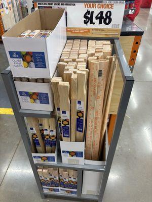 Sticks, rulers and yard sticks. In the paint section.