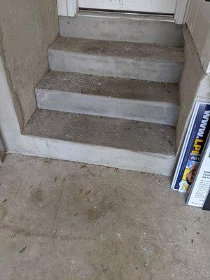 Some of the waste left drained into the garage that the rain won't wash away.