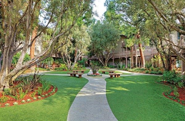 Lush landscaping at The Meadows Apartment Homes