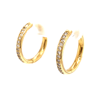 Yellow gold diamond hoop earrings.