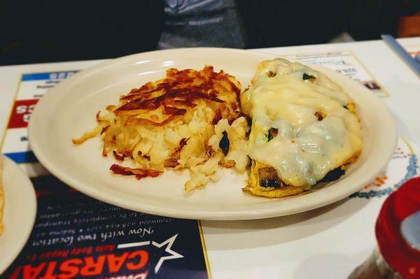 3 egg omlette with Swiss cheese and a side of scratch made hash browns.